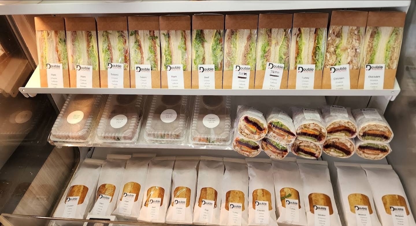 Fridge of freshly made sandwiches, wraps and baguettes